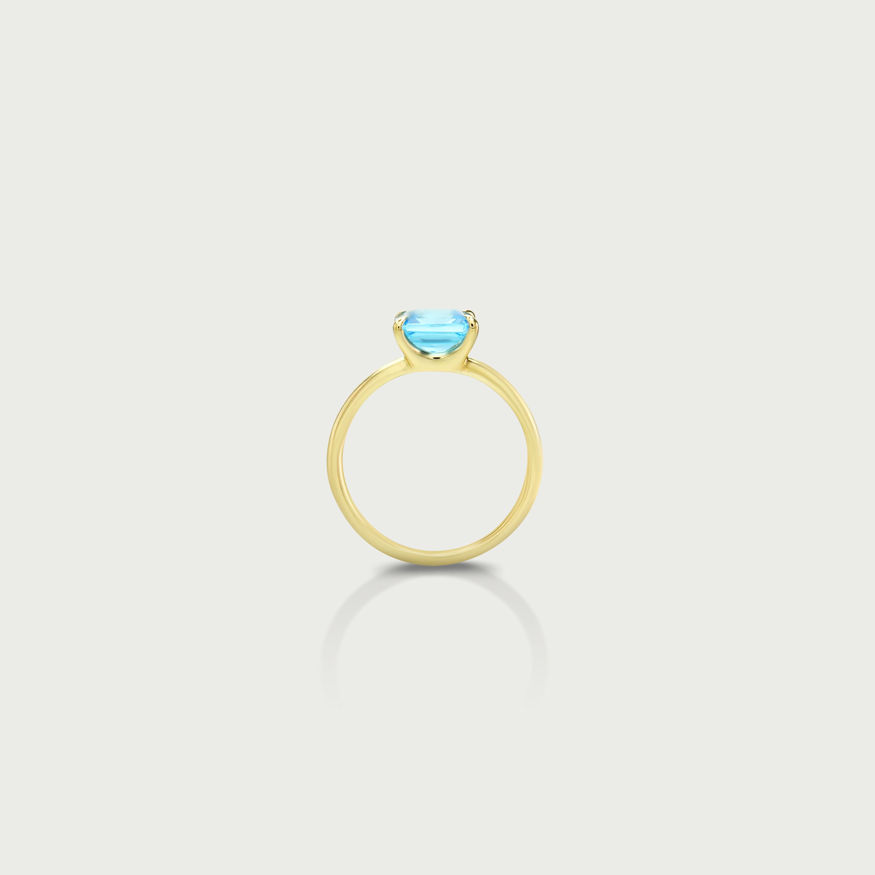 Shine Within Blue Topaz Solitaire Ring