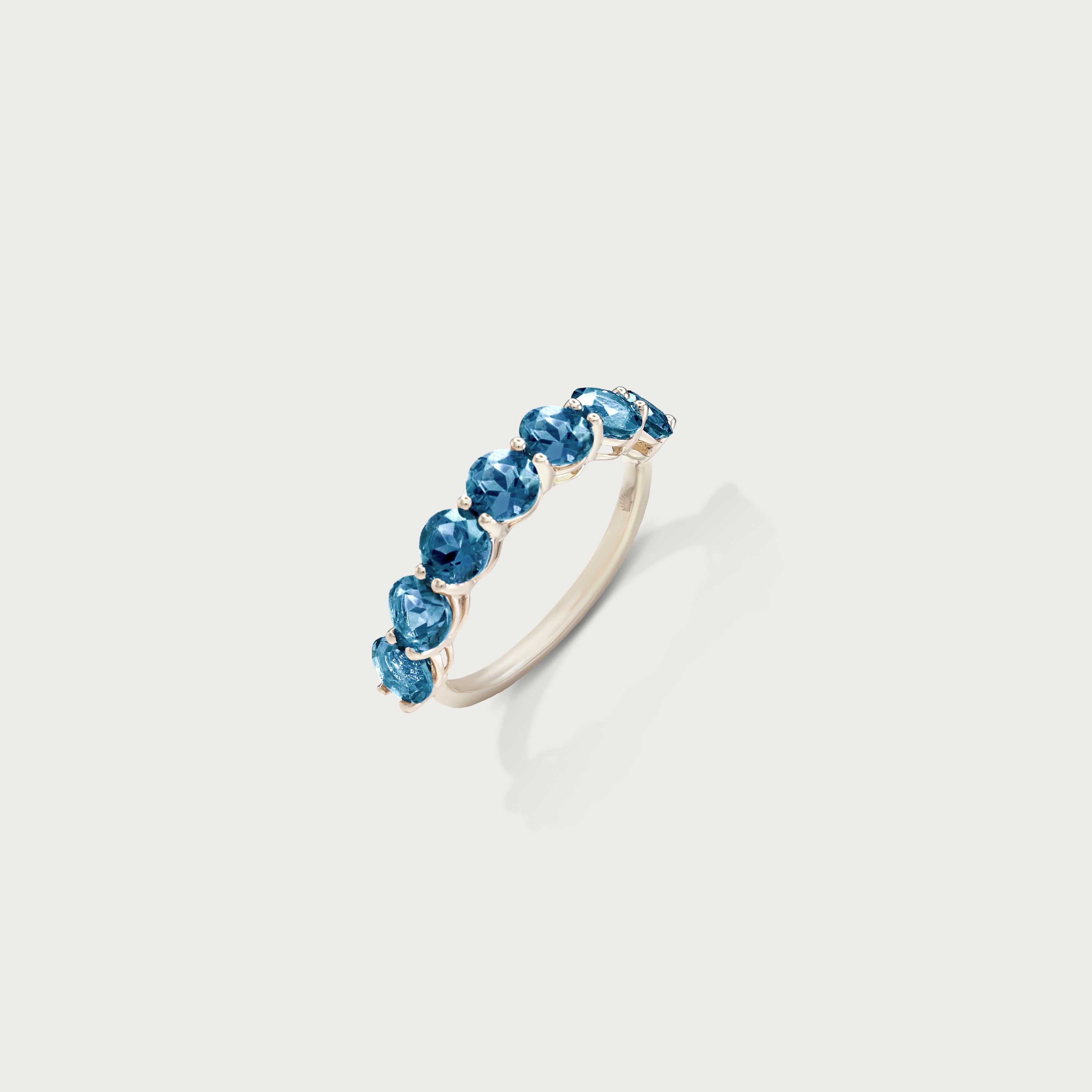 Pure Radiance Blue Topaz Eternity Ring