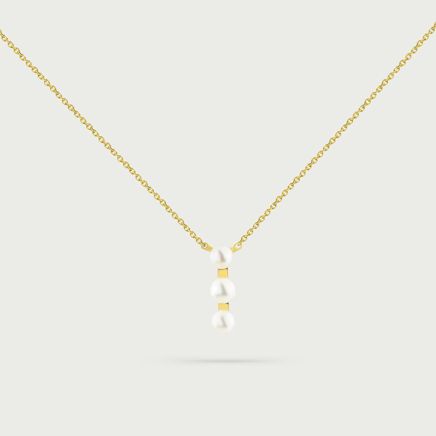 Trinity Charm Pearl Necklace