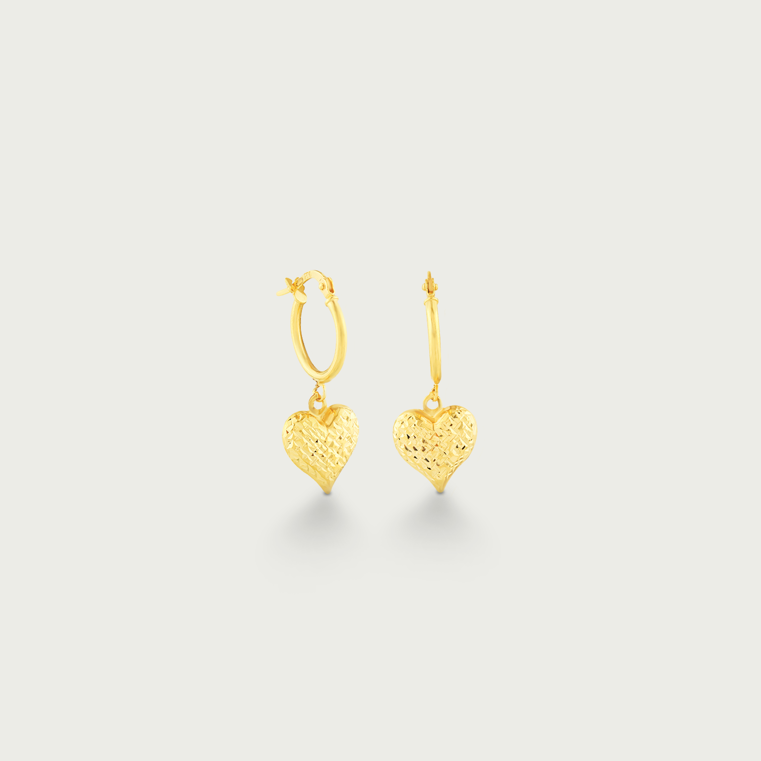 Gleaming Heartbeat Gold Dangling Earrings