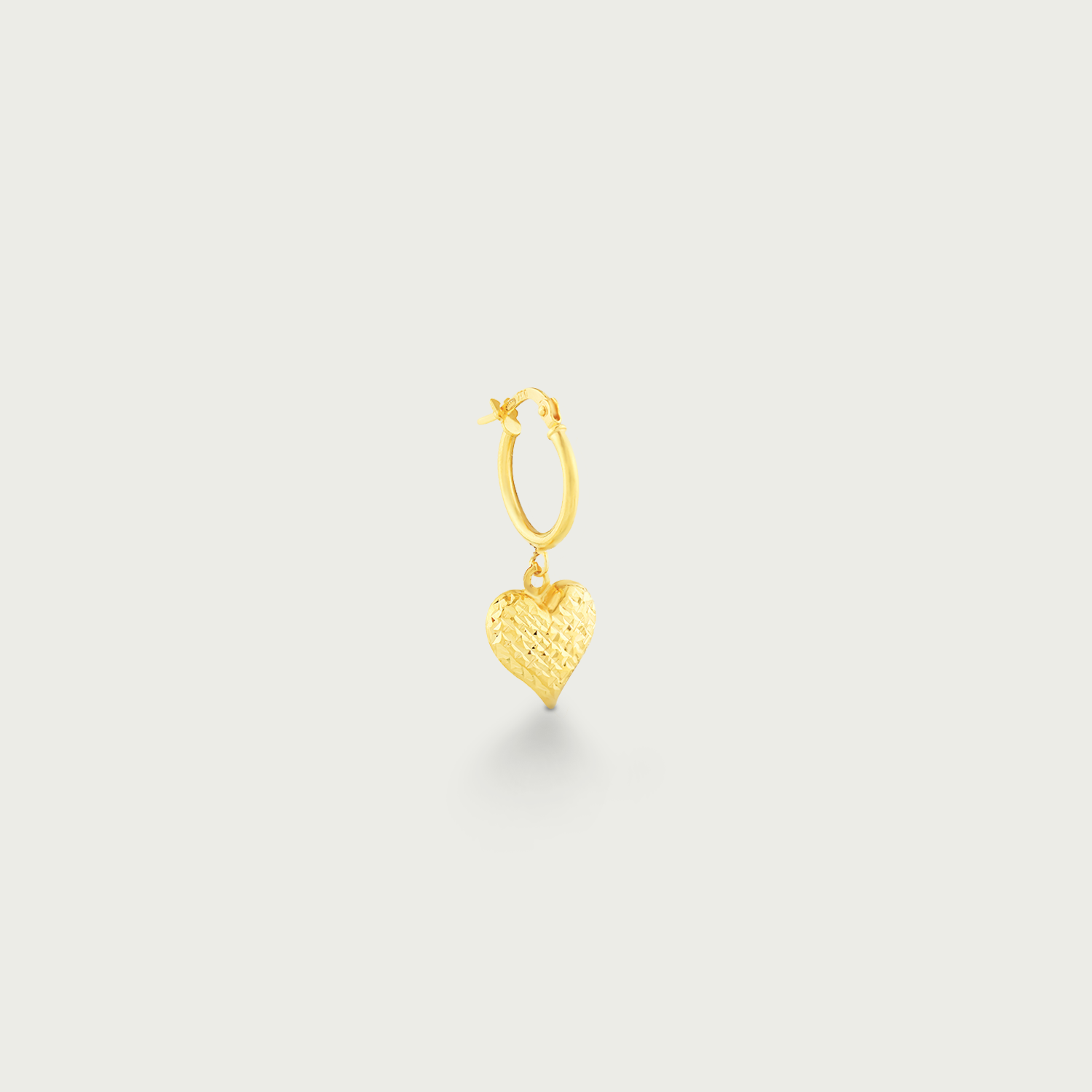 Gleaming Heartbeat Gold Dangling Earrings