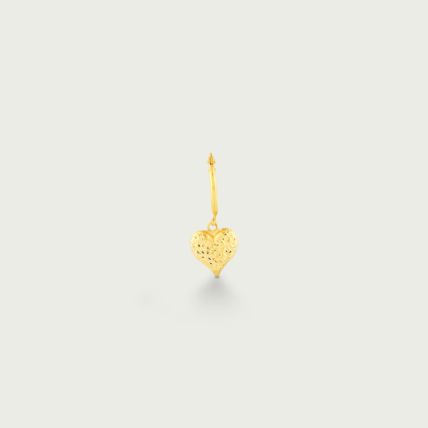 Gleaming Heartbeat Gold Dangling Earrings