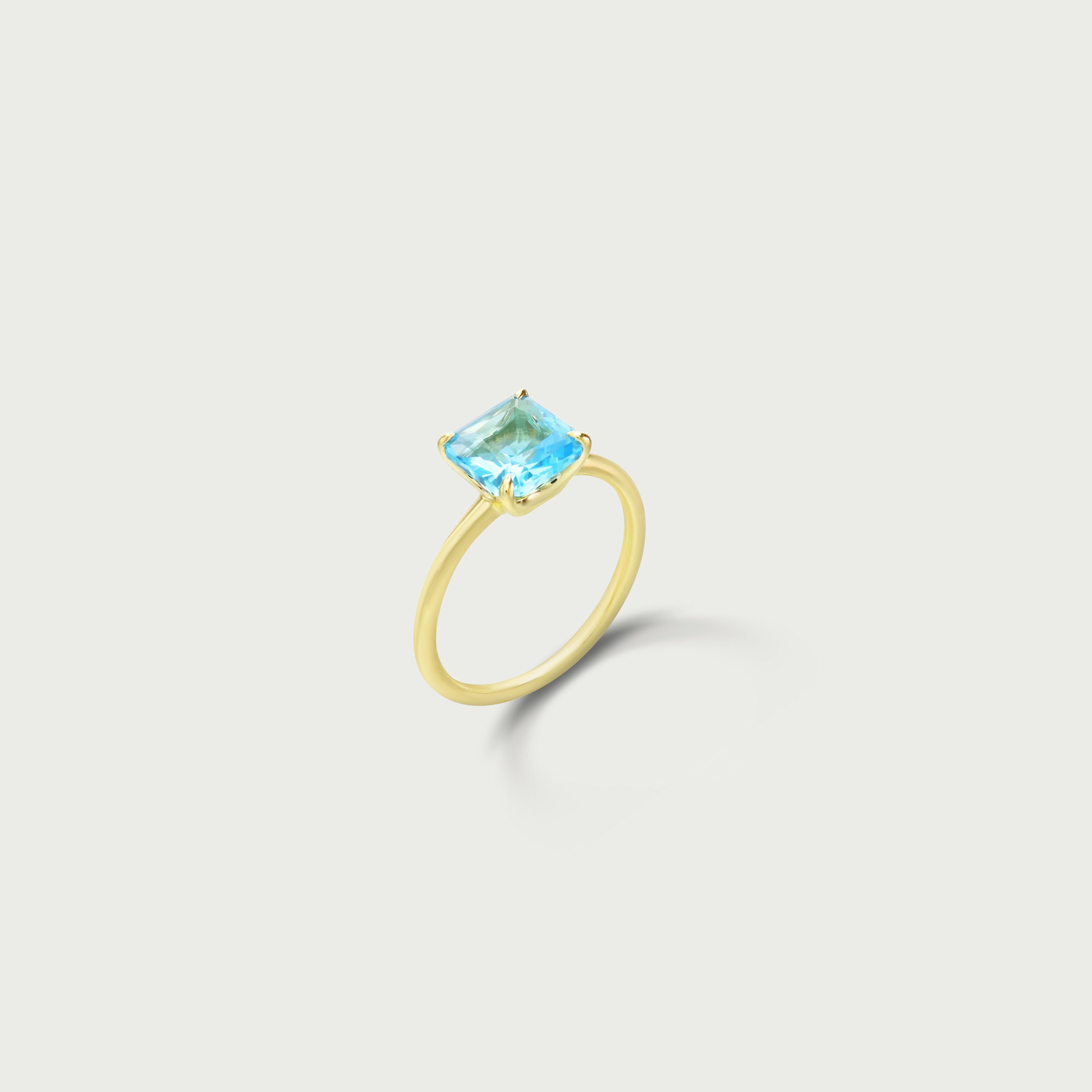Shine Within Blue Topaz Solitaire Ring
