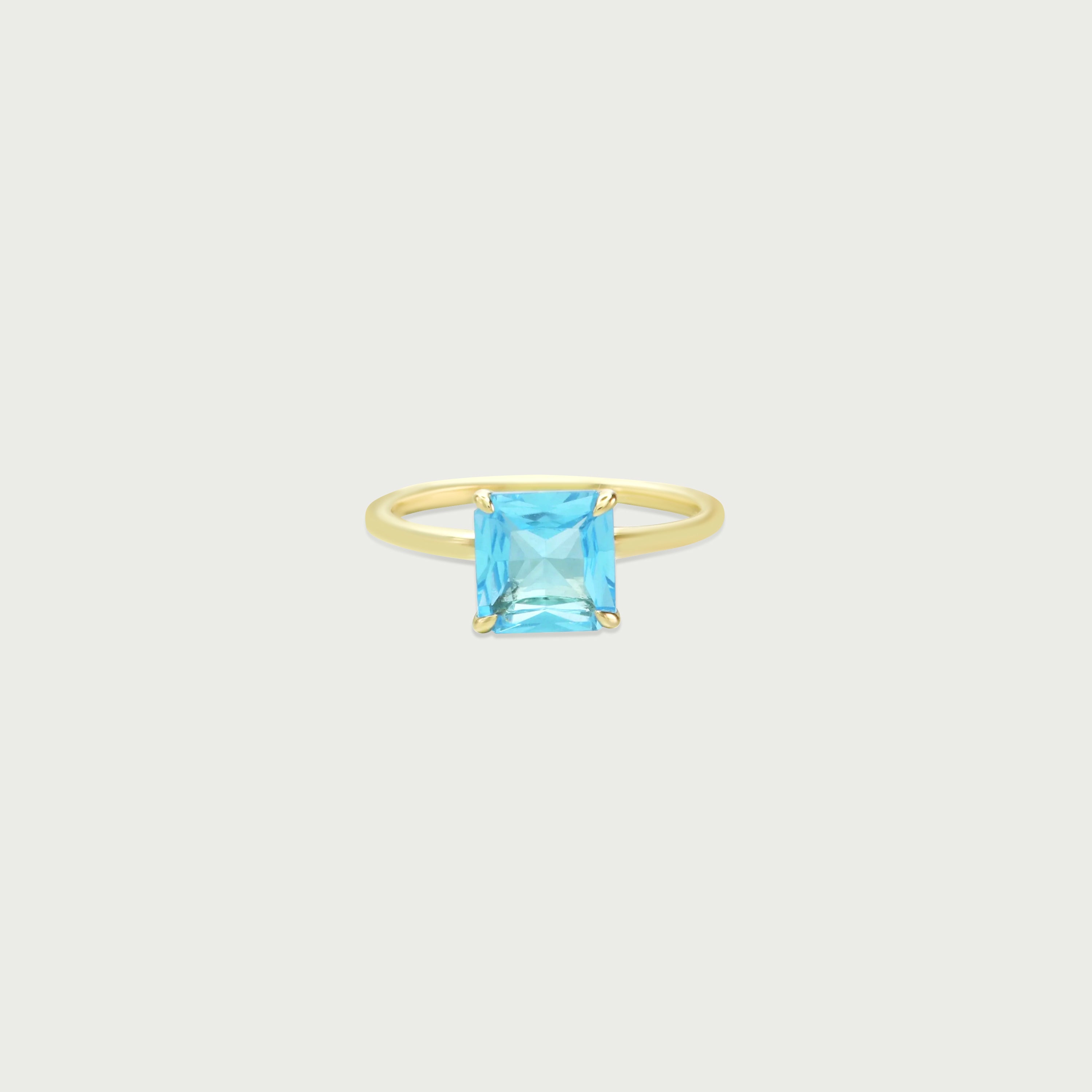 Shine Within Blue Topaz Solitaire Ring