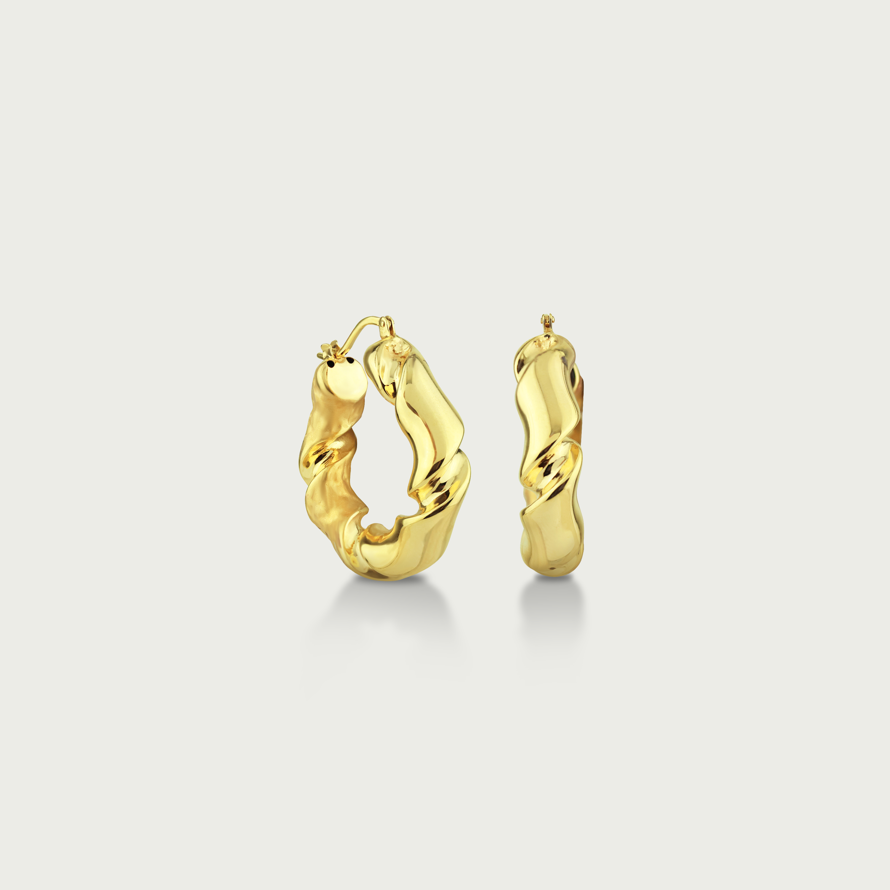Twist and Turn Gold Hoop Earrings