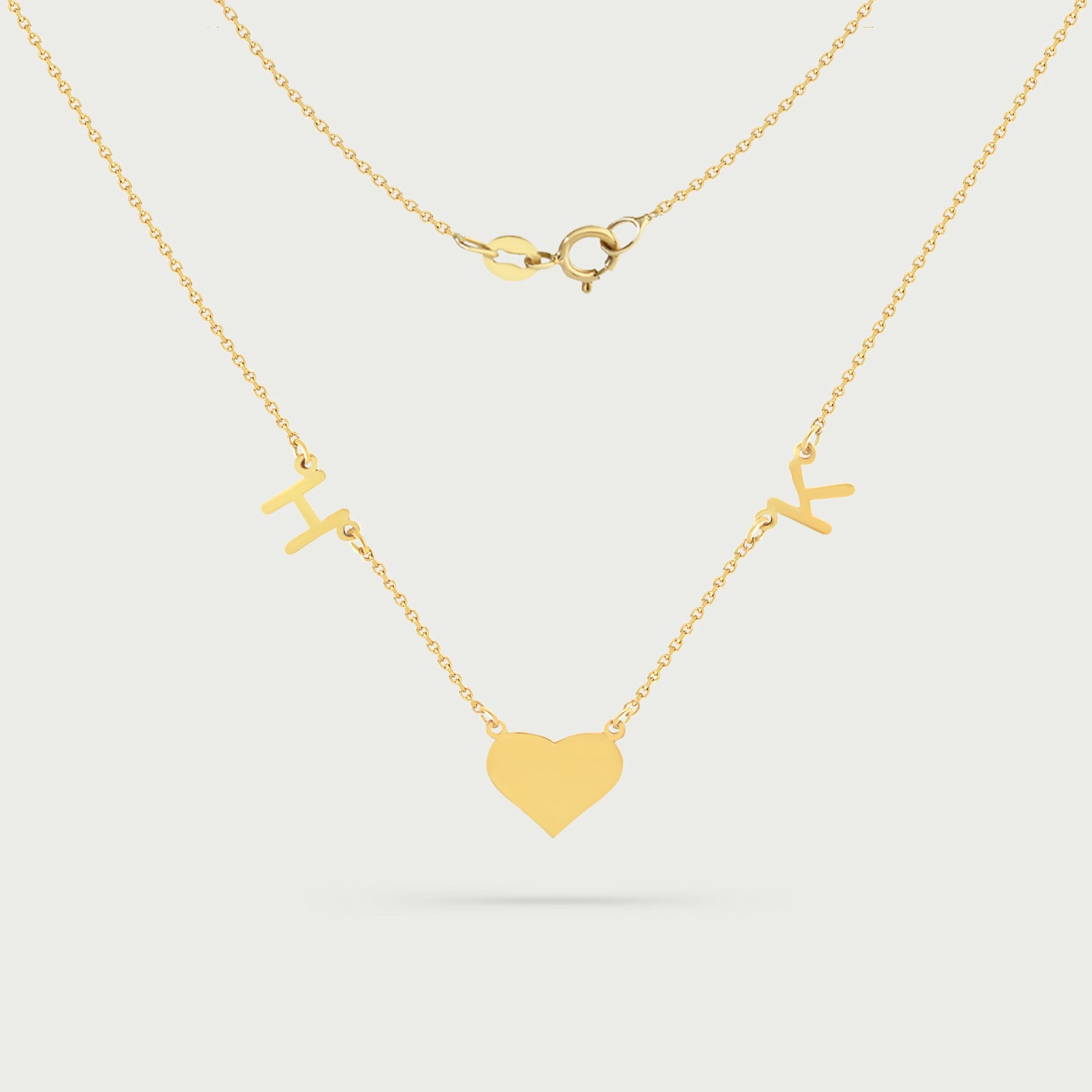 Vianca Initials and a Heart Charm Necklace in Yellow Gold
